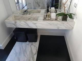 Instalação Sanitária Calacatta Gold, Plurirochas Lda. Plurirochas Lda. Baños de estilo ecléctico Piedra