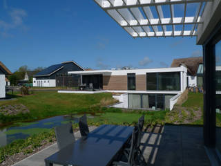 zwembadvilla op Texel, hans moor architects hans moor architects Moderne huizen
