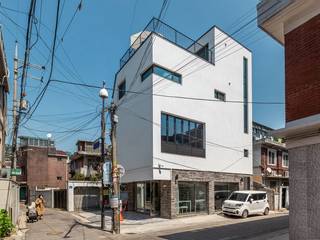 감각을 살린 서울의 예쁜상가주택, 한글주택(주) 한글주택(주) Villas