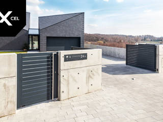 Simply Concrete. Nowoczesne ogrodzenie z betonu i aluminium, XCEL Fence XCEL Fence สวนหน้าบ้าน