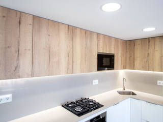 Reforma integral en Cornellà de Llobregat, Grupo Inventia Grupo Inventia Built-in kitchens Wood-Plastic Composite Wood effect