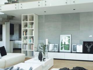 Beton architektoniczny na ścianę w salonie, Luxum Luxum Livings modernos: Ideas, imágenes y decoración Hormigón