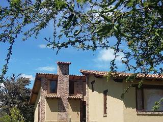 Casa de campo en Boyacá. Colombia, Diego De Castro Korgi. Arquitectura y Construcción Diego De Castro Korgi. Arquitectura y Construcción Заміський будинок Цегла