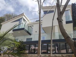 Sistema Sika Thermocoat (SATE) en vivienda unifamiliar en Gibraltar, SIKA SIKA Casas modernas