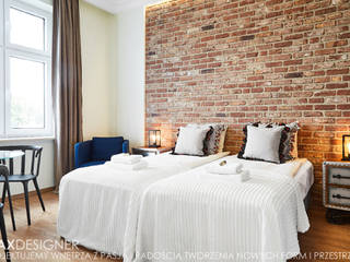 Apartamenty pod wynajem, MAXDESIGNER MAXDESIGNER Eclectic style bedroom Bricks