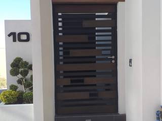 Residencia MO Monterrey Nuevo Le´ón, Mevisa Construcciones Mevisa Construcciones Modern style doors