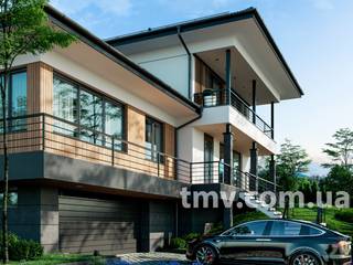 Стильный двухэтажный дом с гаражом на рельефном участке, TMV Homes TMV Homes