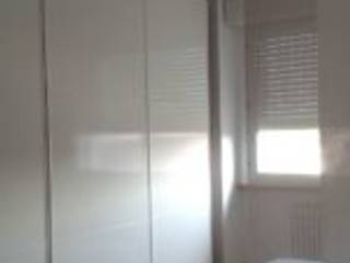 Feng Shui: nuovo appartamento di una giovane coppia, Aire Studio Associato Aire Studio Associato モダンスタイルの寝室