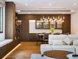 Reforma integral de una vivienda elegante en la zona alta de Barcelona, HELVETIC DESIGN PROPERTIES HELVETIC DESIGN PROPERTIES Modern living room