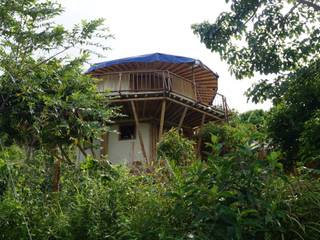 Edificio Bahaoa - Akashaja: Yoga y desarrollo humano, IMZA Arquitectura IMZA Arquitectura Casas passivas Bambu Verde