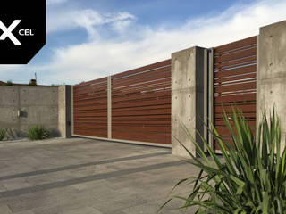 Concrete Jungle. Nowoczesne ogrodzenie z aluminium i betonu, XCEL Fence XCEL Fence Jardines delanteros