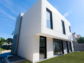 Proyecto en Madrid capital, The Concrete Home The Concrete Home منازل