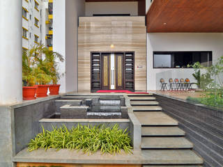 Mr.Ramesh villa, GS Studio Design Consultants GS Studio Design Consultants Moderner Flur, Diele & Treppenhaus Marmor Grau