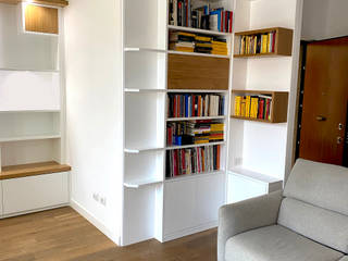 Soggiorno con parete attrezzata e libreria, Falegnamerie Design Falegnamerie Design Soggiorno moderno Legno Effetto legno
