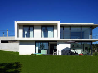 Vivienda en Sionlla, AD+ arquitectura AD+ arquitectura Casa unifamiliare Cemento Bianco