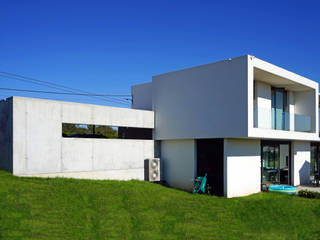 Vivienda en Sionlla, AD+ arquitectura AD+ arquitectura Casas unifamiliares Concreto Blanco