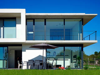 Vivienda en Sionlla, AD+ arquitectura AD+ arquitectura Casa unifamiliare Cemento Bianco