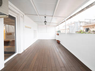 Reforma de terraza en Hospitalet de Llobregat, Grupo Inventia Grupo Inventia Patios & Decks Concrete White