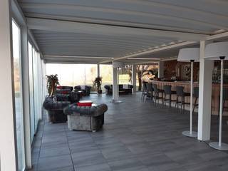 pergola impacchettabile in pvc, unica living design unica living design Spazi commerciali Alluminio / Zinco