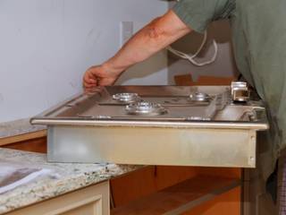 plumber putting in sink, Plumbers Network Alberton Plumbers Network Alberton Kitchen units