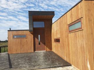 LOTE 14, VISTA LOBOS PICHILEMU, KIMCHE ARQUITECTOS KIMCHE ARQUITECTOS منزل خشبي خشب Wood effect