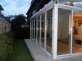 winter garden termici , unica living design unica living design Modern conservatory Aluminium/Zinc