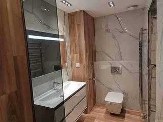 Una Reforma Integral de baño pequeño | Reformas Premium en Madrid | homify, David Mateos García David Mateos García Modern bathroom Tiles Brown