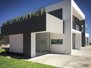 CASA-OCU, Arqcubo Arquitectos Arqcubo Arquitectos منزل ريفي أسمنت