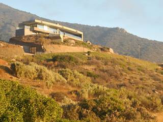 Vivienda Zapallar H-B., Roberto Martinez Bravari -arquitectos asociados Roberto Martinez Bravari -arquitectos asociados Casas unifamiliares Concreto