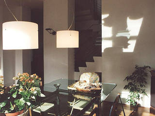 Da uno a due unità abitative_Una finestra sul giardino, Luisa Olgiati Luisa Olgiati Modern dining room