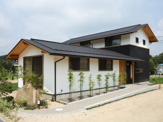 Ku-House Okayama , 三宅和彦／ミヤケ設計事務所 三宅和彦／ミヤケ設計事務所 Rumah keluarga besar Kayu Wood effect