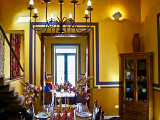 La luz en las Casas Coloniales, Merida Arquitectos Merida Arquitectos Colonial style dining room Limestone