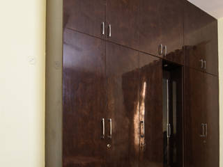 Home interiors installed by Magnon Interiors at a home at Vakil Villa , Magnon Interiors Magnon Interiors Small bedroom