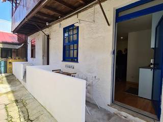 Miguel Bombarda, remodelação de casas em uma pequena ilha no centro do Porto! , Edizur engenharias lda Edizur engenharias lda Casas modernas