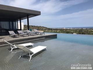 L'architettura della Casa Orizzonte: L'atmosfera distintiva del luogo, G'n'B studio G'n'B studio Piscine a laghetto