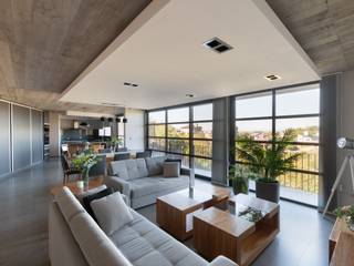 CASA PUENTE AL LAGO, KARLEN + CLEMENTE ARQUITECTOS KARLEN + CLEMENTE ARQUITECTOS Modern living room Concrete White