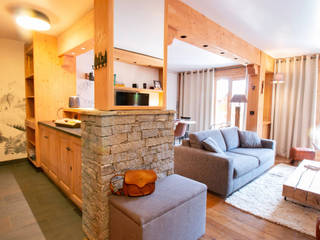 Un chalet haut de gamme à Val d'Isère, Studio Coralie Vasseur Studio Coralie Vasseur Modern living room Stone