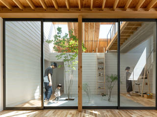 猿払の家, 堀部太建築設計事務所 堀部太建築設計事務所 Modern style balcony, porch & terrace Wood Wood effect