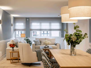 Diseño de piso amplio y acogedor para una familia, Sube Interiorismo Sube Interiorismo Phòng khách phong cách kinh điển Blue