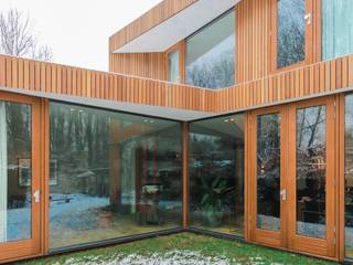 Sloterweg woonhuis, Bas Vogelpoel Architecten Bas Vogelpoel Architecten Chalés e casas de madeira Madeira maciça Multi colorido