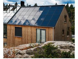 Una casa sostenible que ahorra energía SunRoof Techos a dos aguas Negro