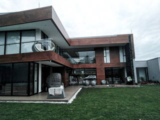 Diseño de fachada casa Gómez Salazar, Dot Arquitectura + diseño S.A.S Dot Arquitectura + diseño S.A.S Country house Wood Wood effect