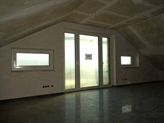 Passivhaus KfW-40 plus, Doppelhaushälfte, Junker Architekten Junker Architekten モダンスタイルの寝室