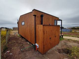 VIVIENDA MINIMA SECTOR PANGAL, KIMCHE ARQUITECTOS KIMCHE ARQUITECTOS Casas pequenas Madeira Efeito de madeira