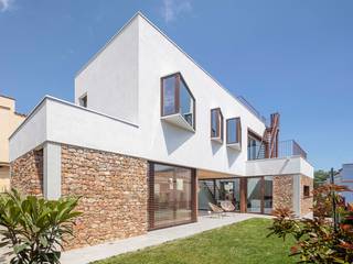 CASA D'EN JAUME, GUILLEM CARRERA arquitecte GUILLEM CARRERA arquitecte Casa unifamiliare Pietra