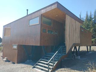 LOTE 28, TAIVARUA PICHILEMU, KIMCHE ARQUITECTOS KIMCHE ARQUITECTOS Chalés e casas de madeira Madeira Efeito de madeira