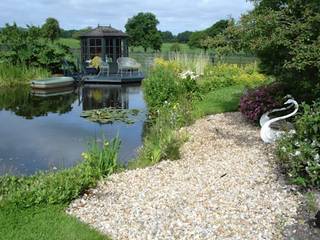 An Amazing Yet Informal Swimming Pond, Water Garden Ltd Water Garden Ltd بركة مائية