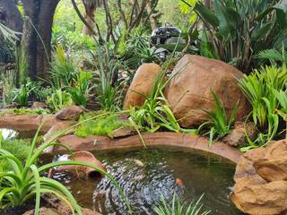 New pond installation, Young Landscape Design Studio Young Landscape Design Studio بركة مائية