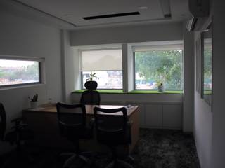 Interioforest helped an organization to come alive, Interioforest Plantscaping Solutions Interioforest Plantscaping Solutions Modern Study Room and Home Office