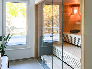 Sauna im Badezimmer einer Penthouse-Wohnung| KOERNER Saunamanufaktur, KOERNER SAUNABAU GMBH KOERNER SAUNABAU GMBH 桑拿